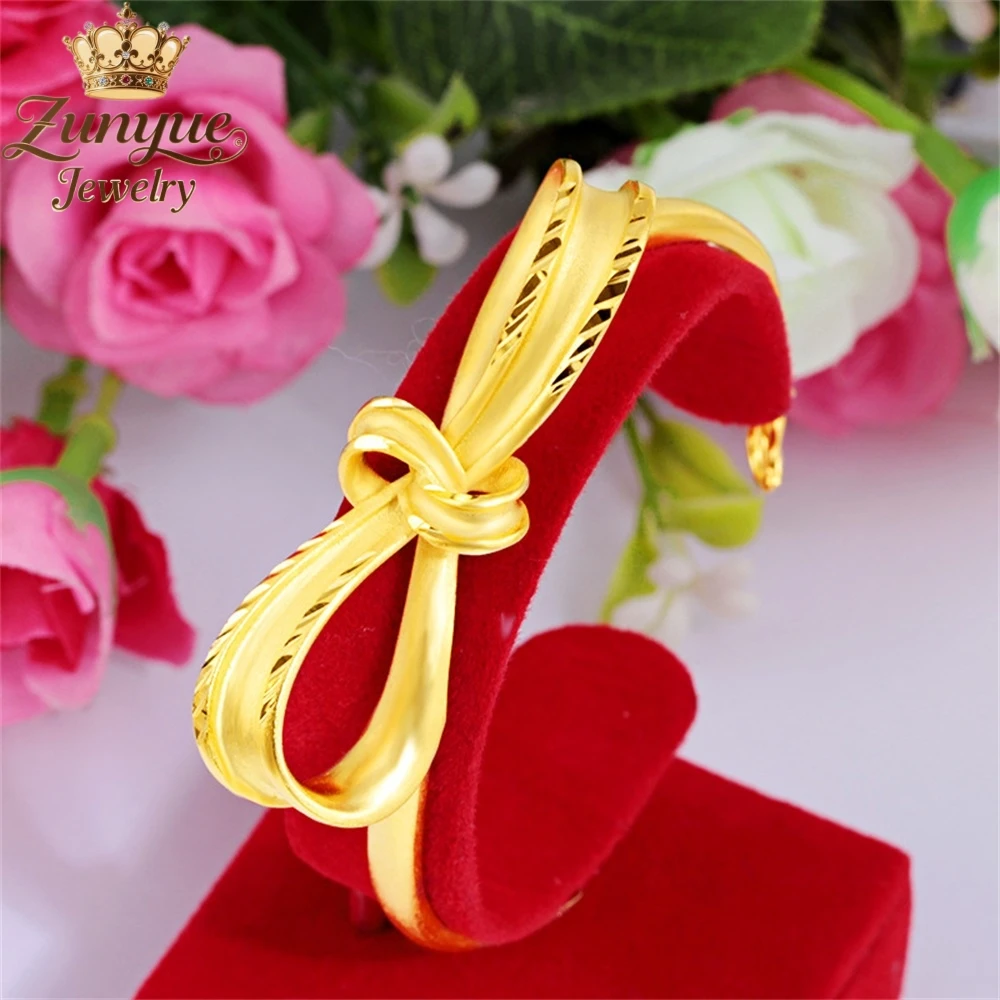 

Sand Gold Three-Dimensional Hollowed-Out Bow Bracelet Luxury Quality Jewelry Exquisite Elegant Fashion Jewelry Charms Popular