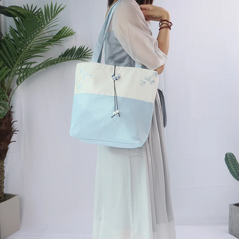 Bolso de mano bordado para mujer con patrón de flores y hierba, bolso de hombro de moda de estilo chino de lona Retro artístico