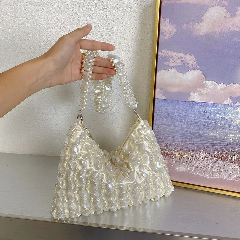 

French small fragrance elegant temperament irregular pearl underarm bag niche design light luxury high-end dinner bag