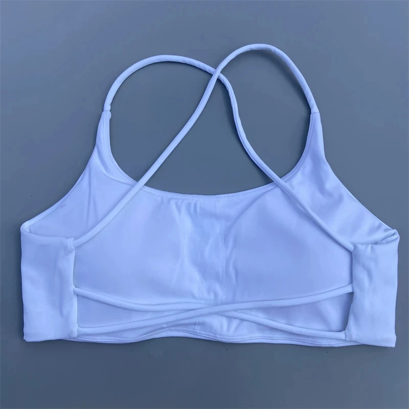 Sujetador de Fitness de Color sólido para mujer, Top deportivo suave y ajustado de alta resistencia, ropa interior de entrenamiento integral para