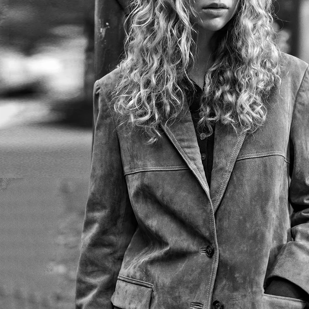 TWOTWINSTYLE Solid Patchwork Button Loose Coat For Women Lapel Long Sleeve Minimalist Temperament Coats Female Fashion Style New