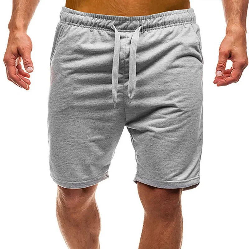 Męskie bawełniane spodenki jednokolorowe szorty na co dzień luźne spodenki plażowe Camisa Masculina szorty Streetwear modne Pantalones Cortos