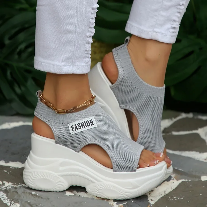 

Summer New Knitted Shoes Fairy Fish-mouth Wind Cake Sole High Heel Flying Weave Slope Heel Thick Sole Sports Women's Sandal