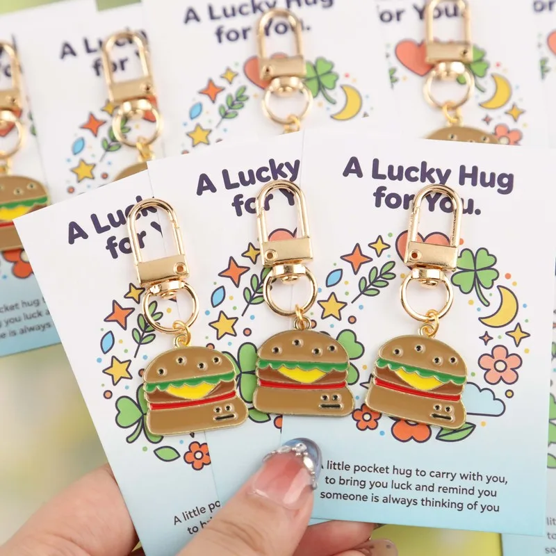 5/10Fun Burger Lucky Hug Keychain Set Comes with a lucky hug greeting card Backpack and school bag charms, festive accessories T