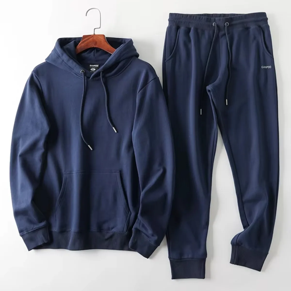 

Men's 2025 All Cotton Looped Sports Set! Spring and Autumn Men's Solid Color Hoodie+Elastic Waist Foot Tight Pants Two Piece Set