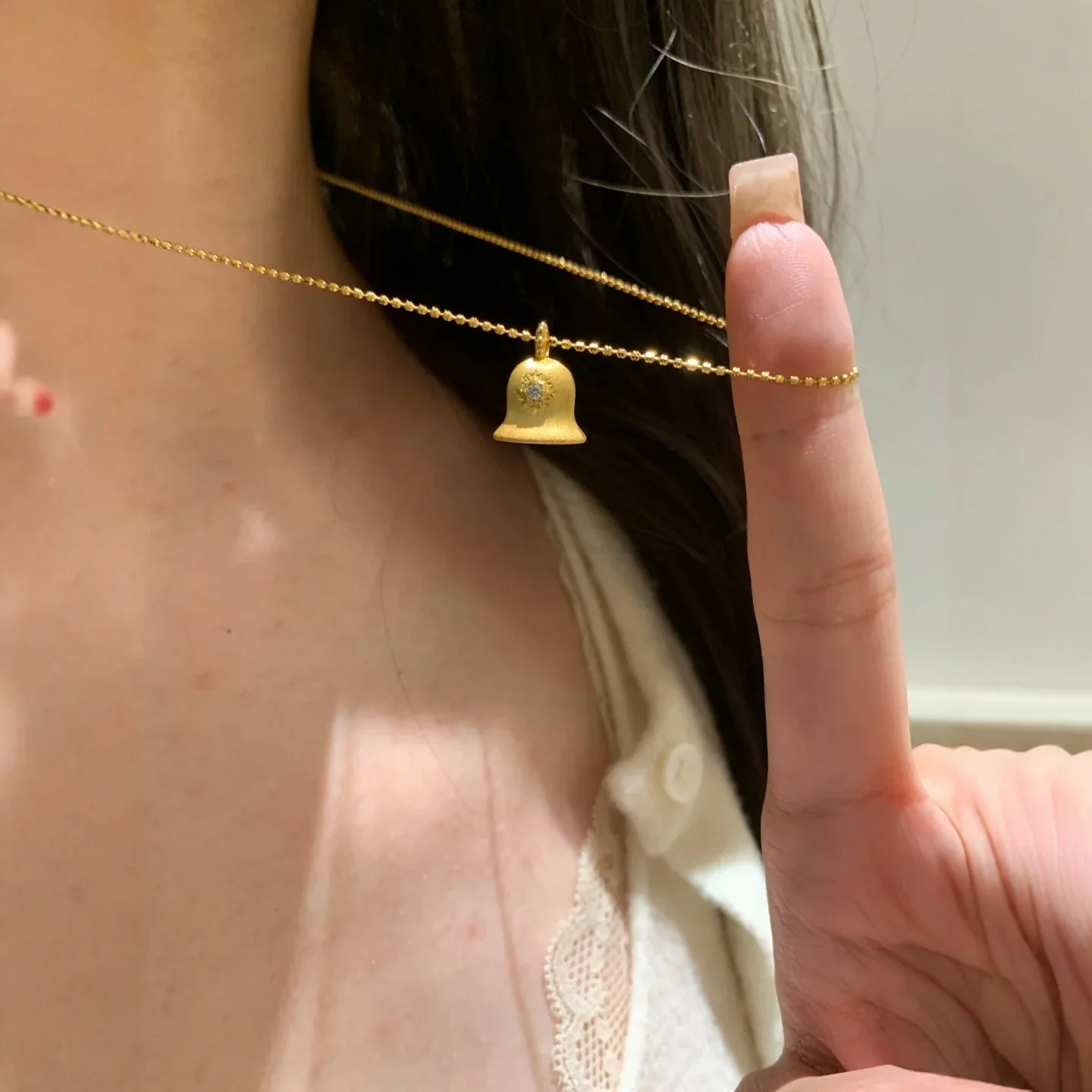 9999 gold brushed silver bell necklace - A unique and exclusive design, highly versatile and fashionablechain for the neck.
