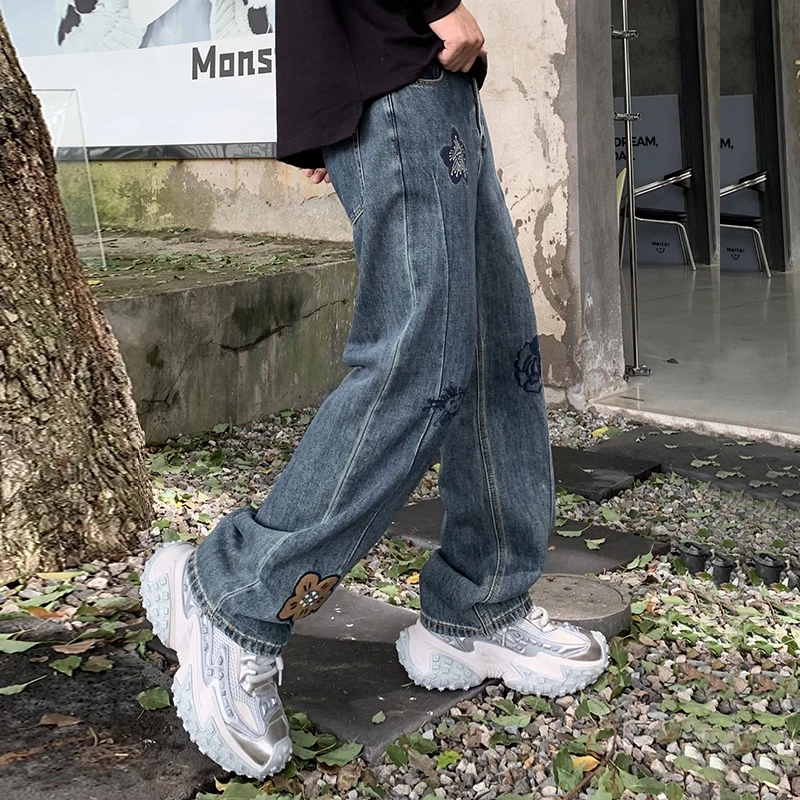 Nuovo design personalizzato petalo ricamo jeans da uomo afflusso da uomo di pantaloni casual versatili larghi a gambe larghe