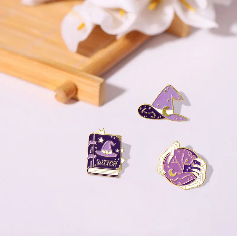 10 PCS / LOT Witchcraft Enamel Pins Custom Purple Wizard Hat Book Ball Cat Brooch Lapel Badge Bag Gothic Jewelry 