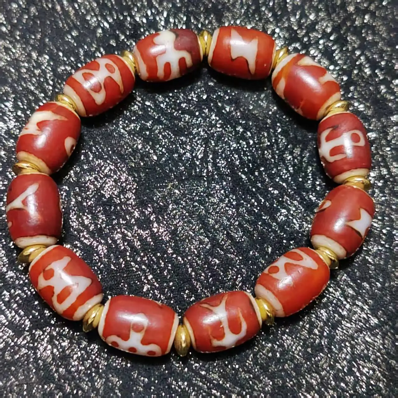 

Tibetan ethnic bracelet featuring the God of Wealth with 5 eyes, lightning, multiple treasures, agate, and celestial beads, Dzi