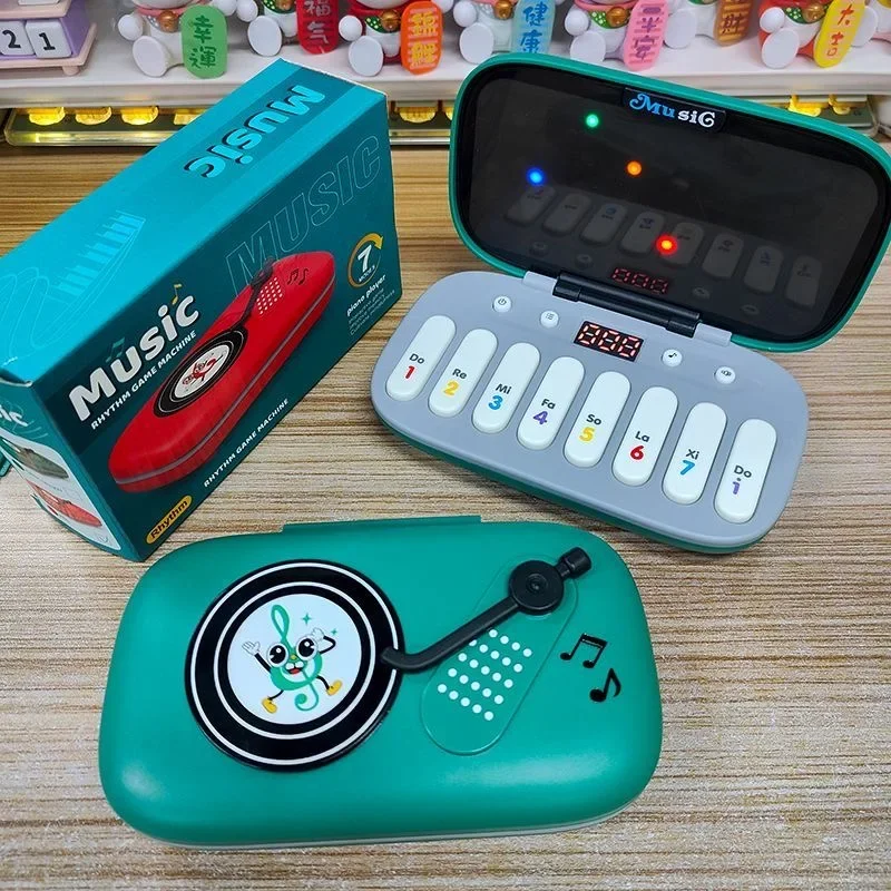 ของเล่นคีย์บอร์ดอิเล็กทรอนิกส์สำหรับเด็ก เครื่องเล่นเกมดนตรีอิเล็กทรอนิกส์ เกมทดสอบจังหวะ เกมปริศนา แบบพกพา คีย์เรืองแสง เหมาะสำหรับการเดินทาง สไตล์มอนเตสซอรี่