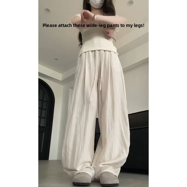 กางเกงลำลองผ้าลินินสไตล์เกาหลีสำหรับผู้หญิง รุ่นใหม่สำหรับฤดูร้อน เนื้อผ้าเบาสบาย ระบายอากาศได้ดี ทรงหลวม ช่วยให้ดูผอมเพรียว ยาวคลุมเท้า