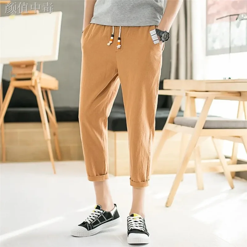 

Мужские брюки свободного кроя с эластичным поясом на шнурке до щиколотки