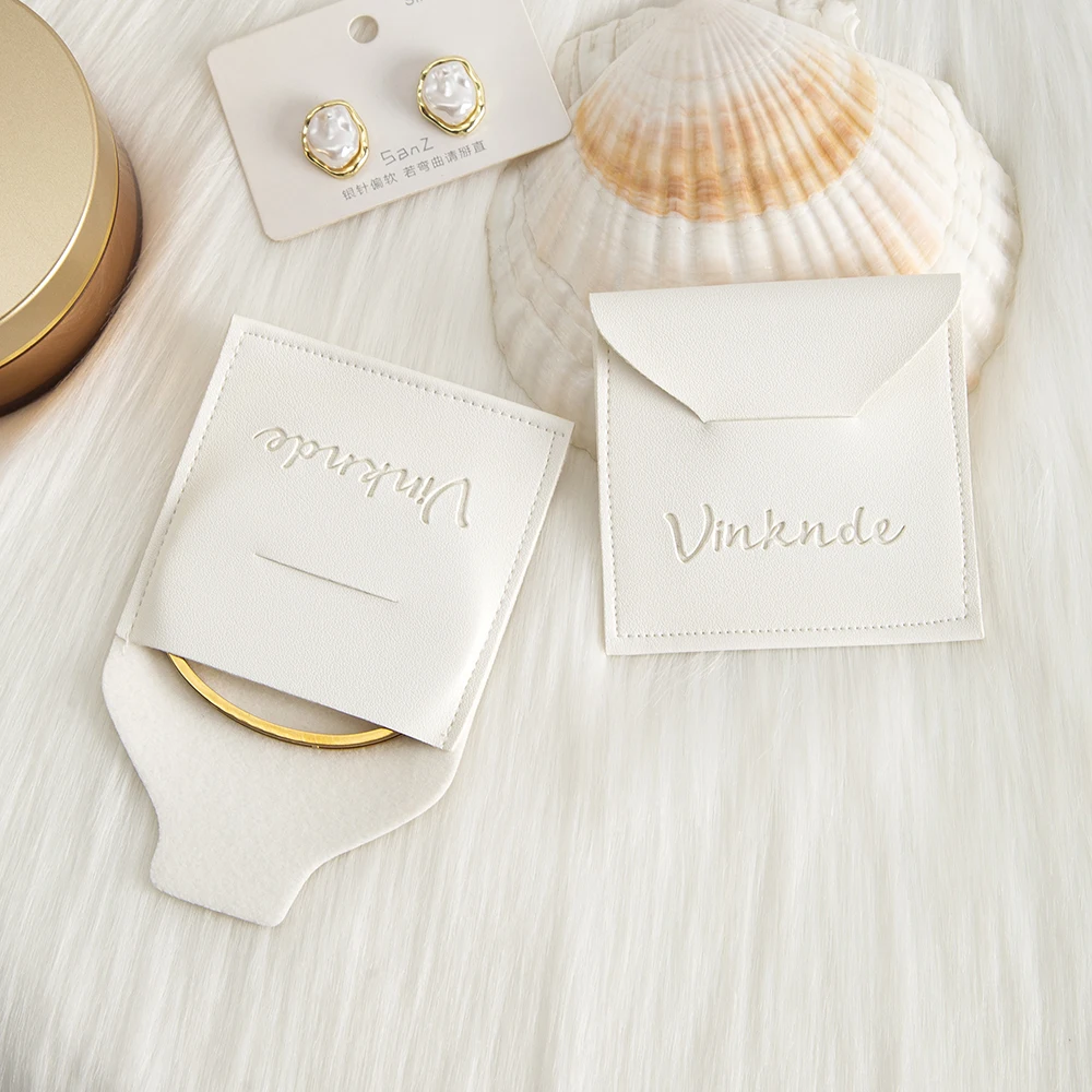 

50pcs Leather Wedding Favor Gift White Bag Envelope Pouch Small Ring Earring Necklace Pendant Storage Package Jewelry Packaging