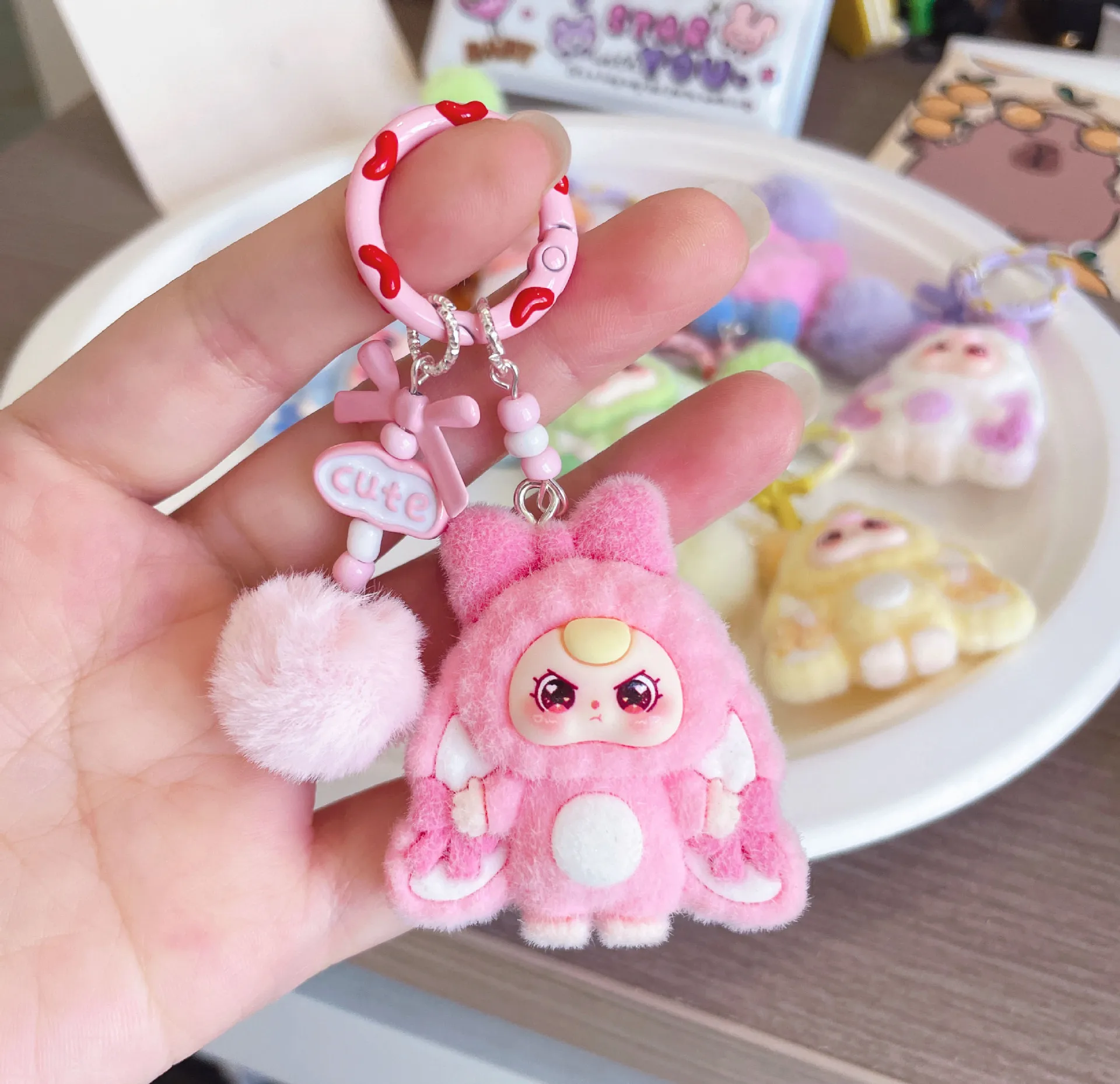 1 Stück dreidimensionaler Schlüsselanhänger – süßer kugelförmiger Schlüsselanhänger mit Schmetterlingsknoten