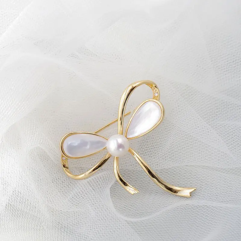 

Минималистичная элегантная брошь из стерлингового серебра 925 пробы, позолоченная 18 карат, дизайн с бантом, инкрустированная натуральным пресноводным жемчугом, брошь в виде моллюсков, подарок