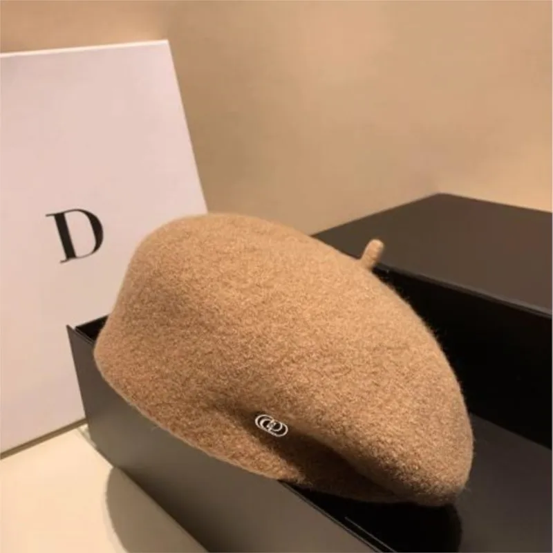 beret headband shows off face little painter's hat and female bud are