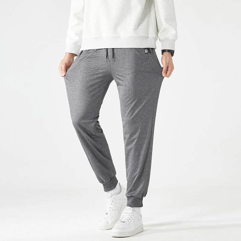 

Autumn Plus Size Men's Sweatpants 6XL Sportswear Elastic Waist Casual Baggy Pants Men Black Grey Joggers New Male Loose Trousers