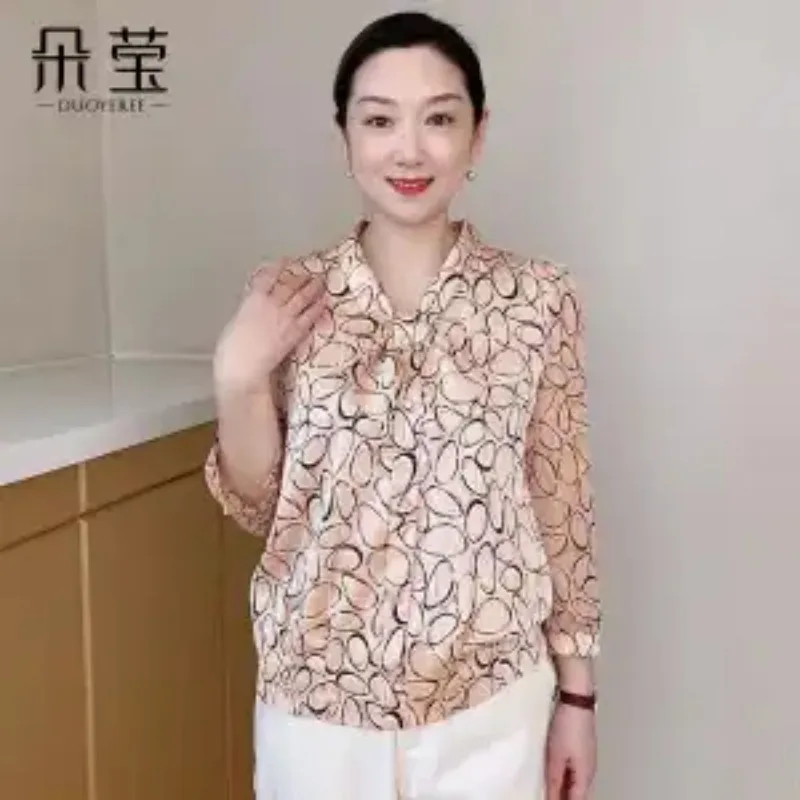 女性の新しいステッチ入り V ネック バタフライ ボタン プリント ファッショナブルなゆったりとした非抵抗性カジュアル長袖シャツ