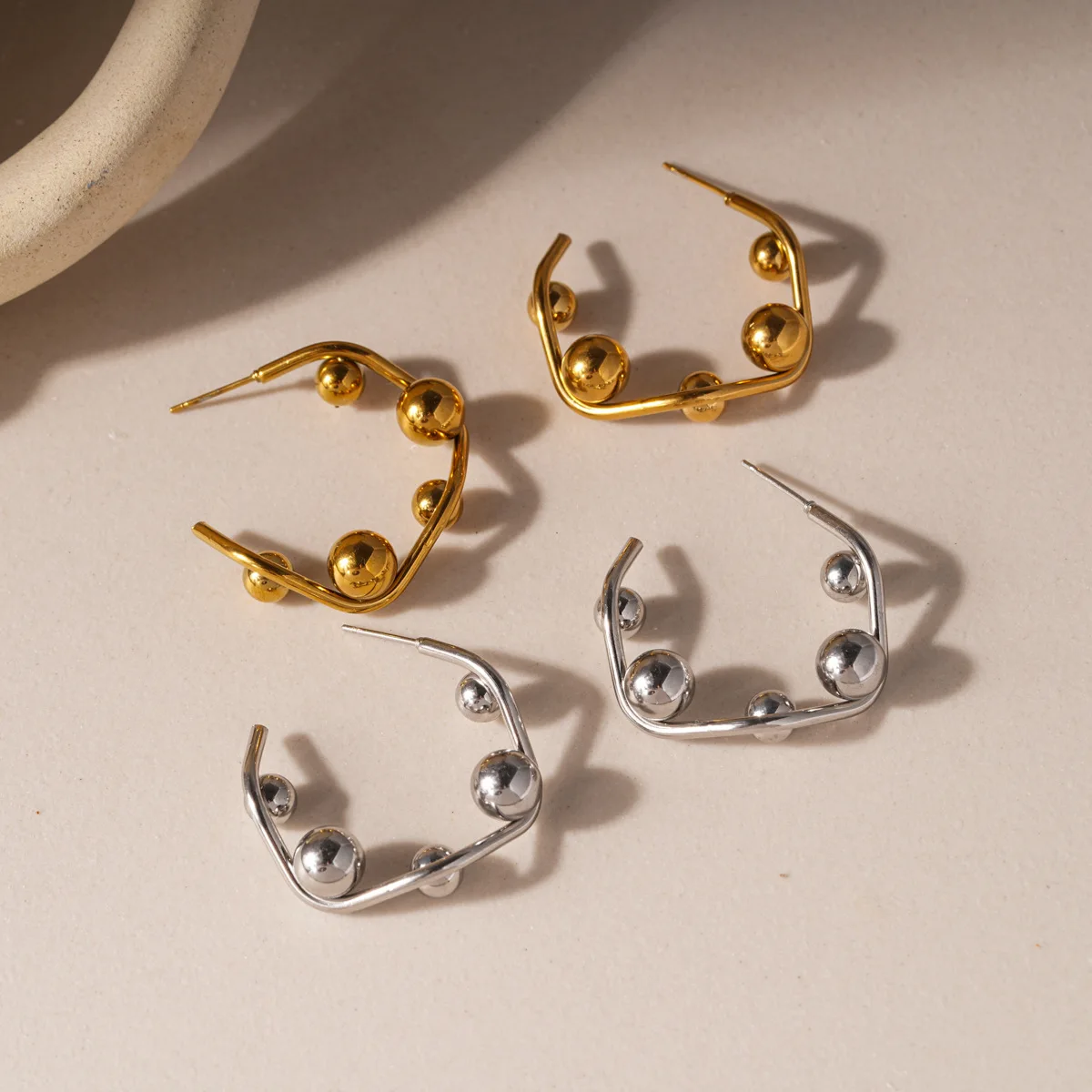 Real gold electroplated geometric twisted round earrings light luxury high-end studs fashion versatile earrings women