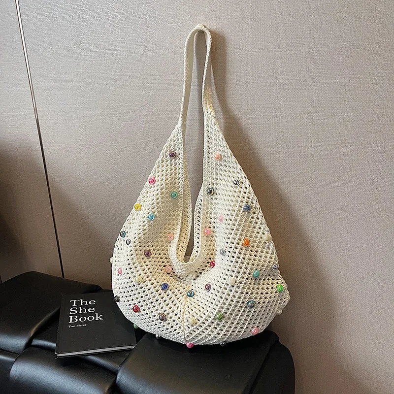 

2025 Summer Pearl Shoulder Bags Knitting Hollow Out Beach Vacation Handbags Ladies Elegant Underarm Bags Commuting Tote Bag