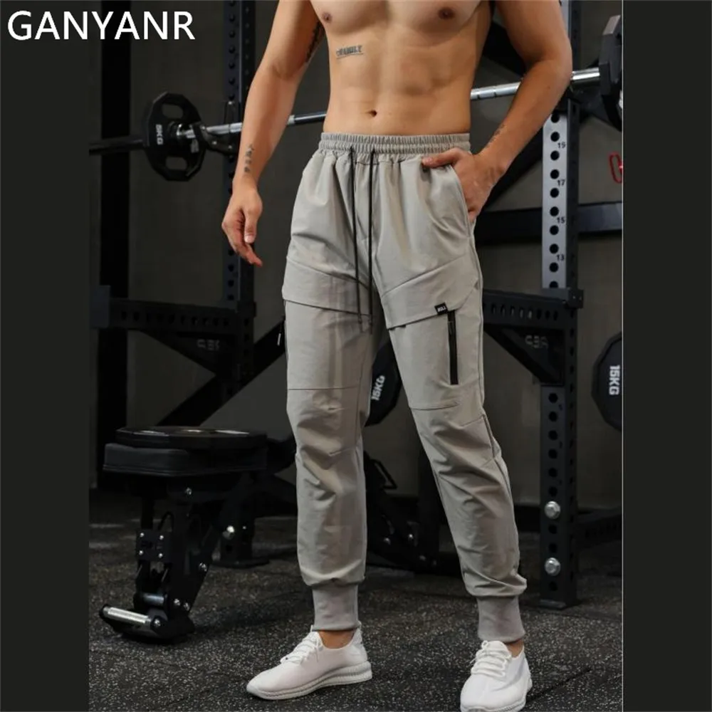 

GANYANR Men Sports Pants Running Trousers Sportswear Sweatpants Jogging Training Cargo Fitness Exercise Gym Athletic Trackpants