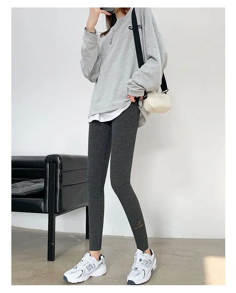 Leggings negros sin costuras para mujer, ropa elevada, abertura de seda de hielo perforada, piernas brillantes, pierna ancha divertida para Halloween, cordón Ol todos los días