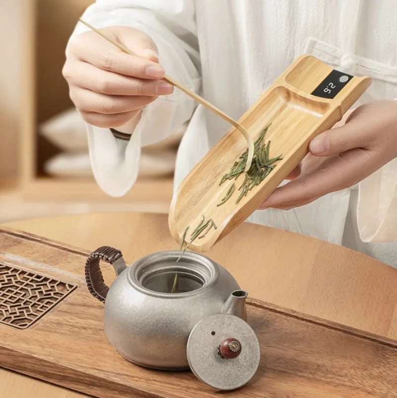 

Solid wood Nanzhu tea is called electronic tea, and electronic scales weigh tea utensils