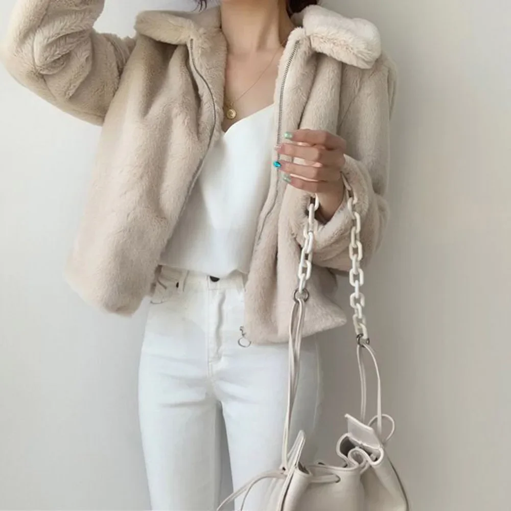 La temporada gran oferta de Otoño Invierno nueva chaqueta peluda cálida con solapa gruesa piel Artificial estilo corto Top de piel de conejo