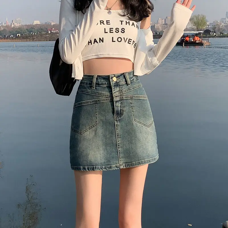 

Ретро-юбка из американского денима для женщин, летняя новинка, модная, с завышенной талией, утягивающая, А-силуэт, короткая, облегающая