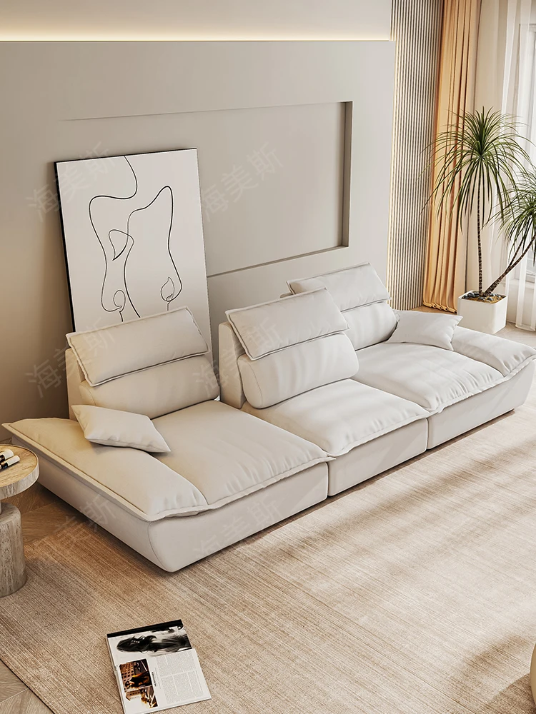 

The sailboat sofa has a high backrest and an adjustable back, modern and minimalist