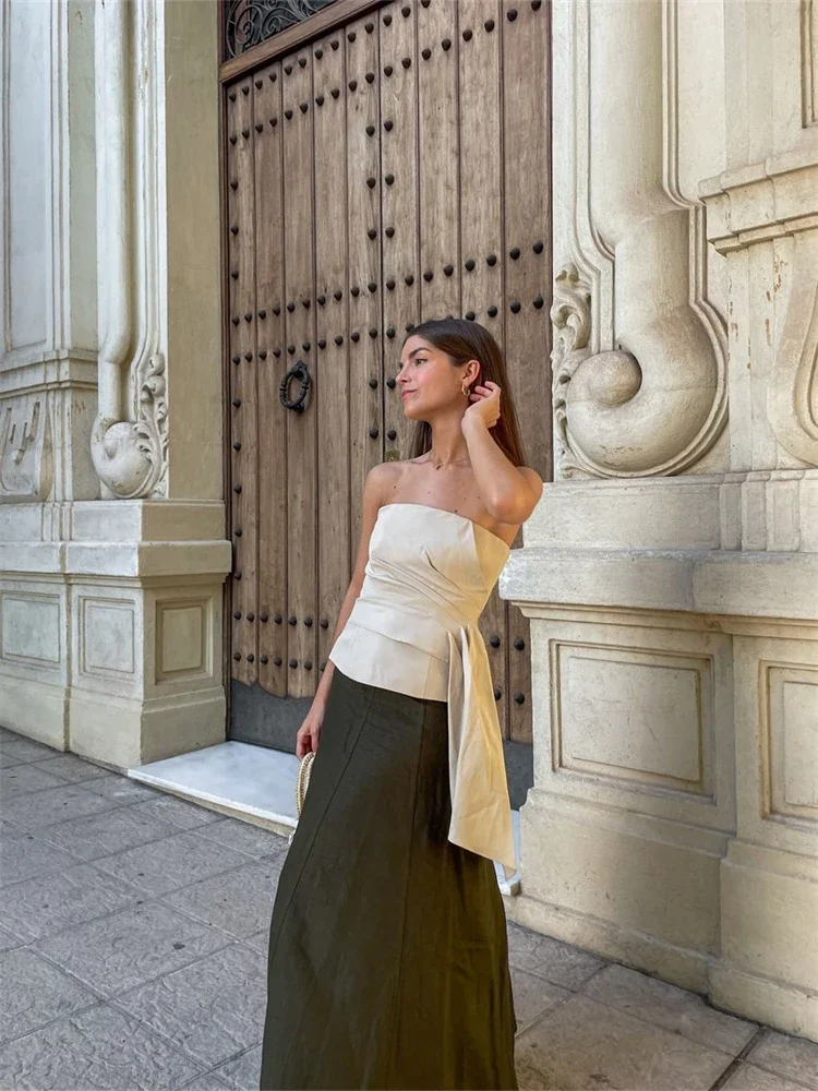 سترة نسائية مثيرة غير متماثلة بدون حمالات قابلة للطي بدون أكتاف بدون أكمام سترة نسائية موضة صيف 2024 ملابس خروج نسائية