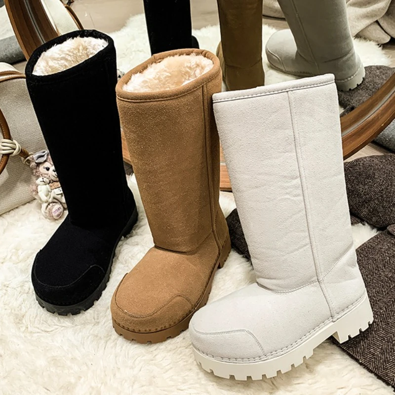 

Ladies' mid-calf boots with round toe sleeves, fleece lining and thick soles are essential for dresses, sweaters, etc