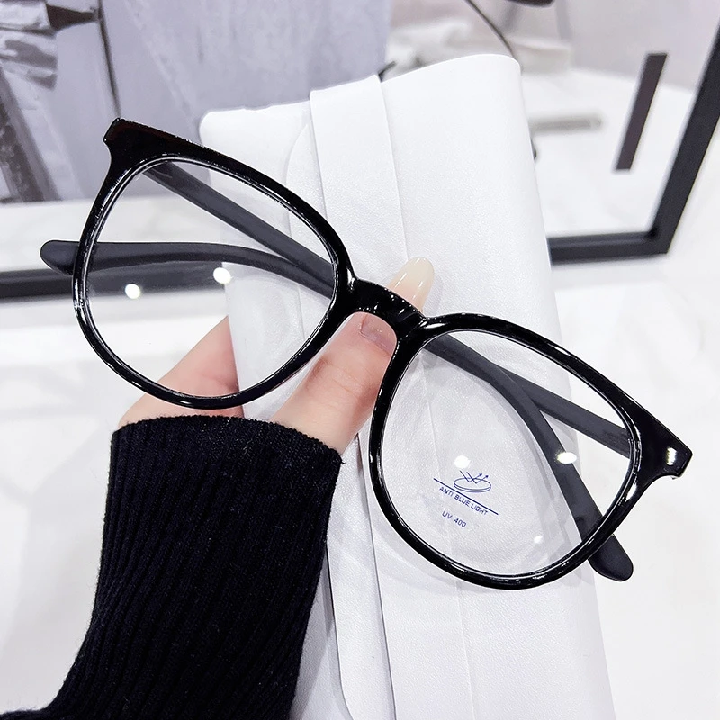 

Korean version of fashion personality oval glasses frame trend new literary all-in-one ladies ultra light anti-blue glasses