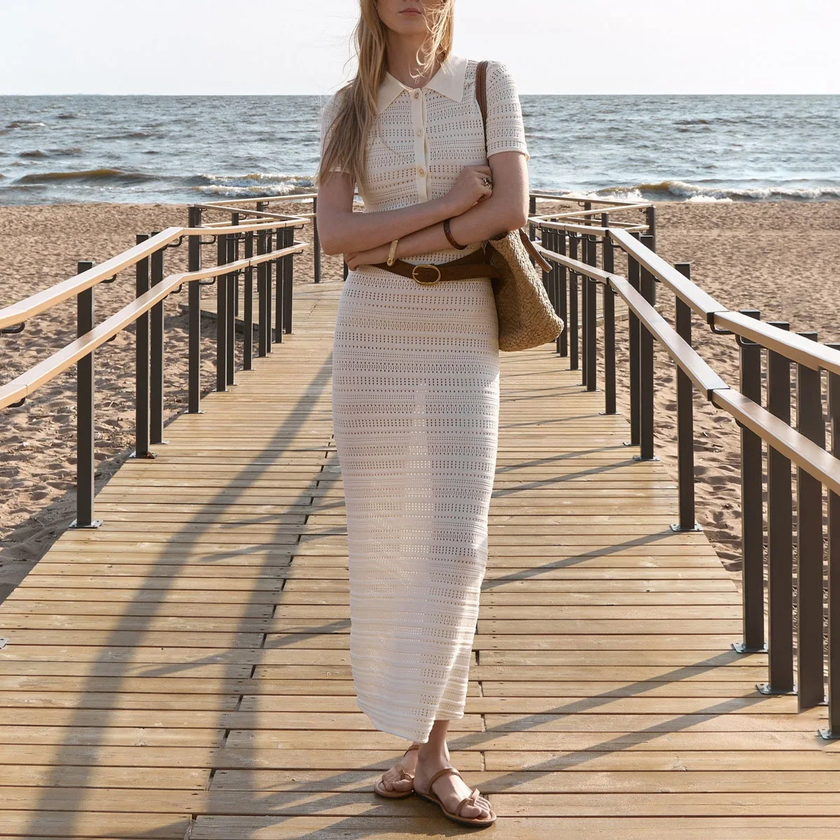 فستان محبوك KWTX أنيق أنيق بقصة ضيقة ومصمم مخرم بتصميم بسيط مناسب للشاطئ أو المكتب لربيع وصيف 2026.