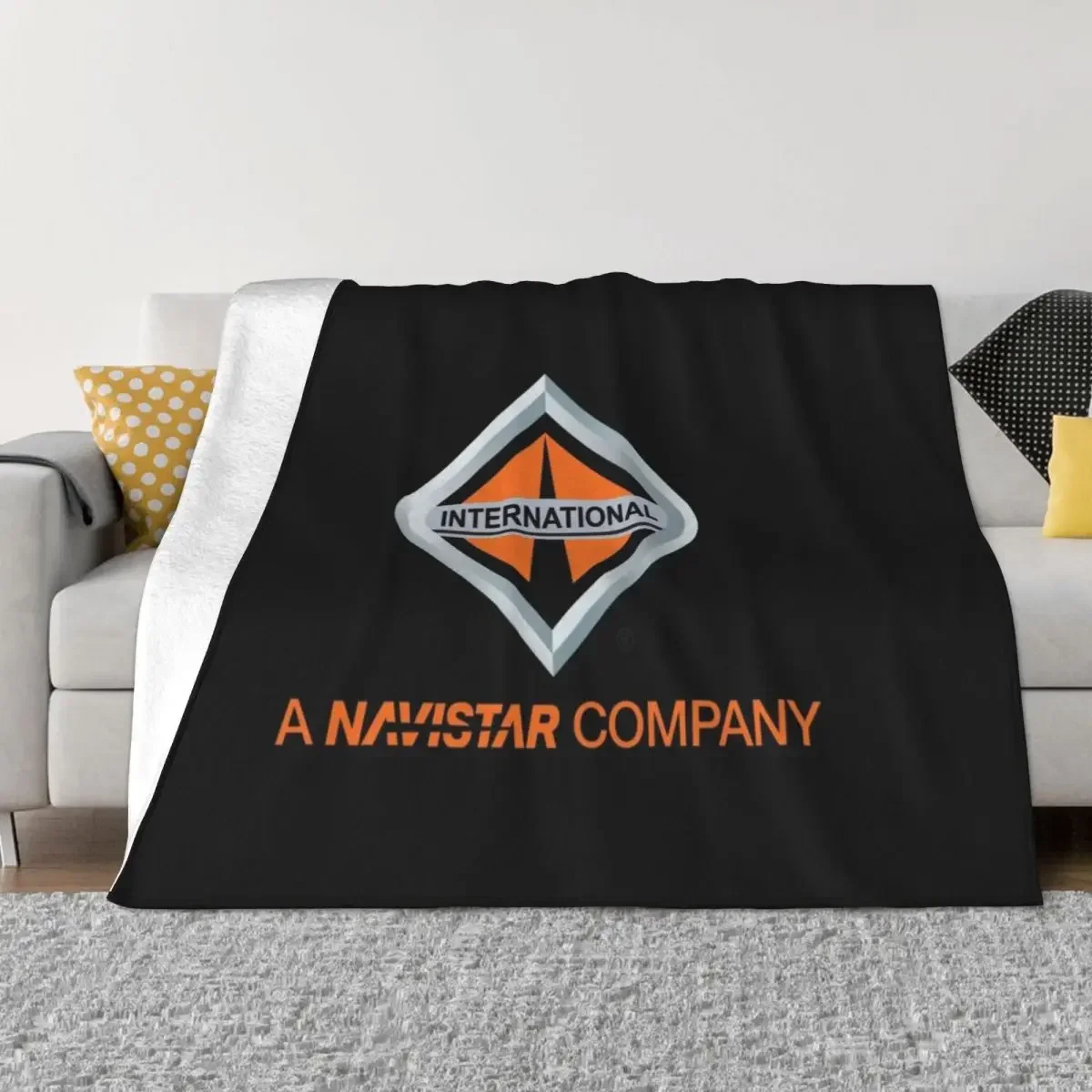 Navistar International Throw Blanket Nap Plaid on the sofa Blankets