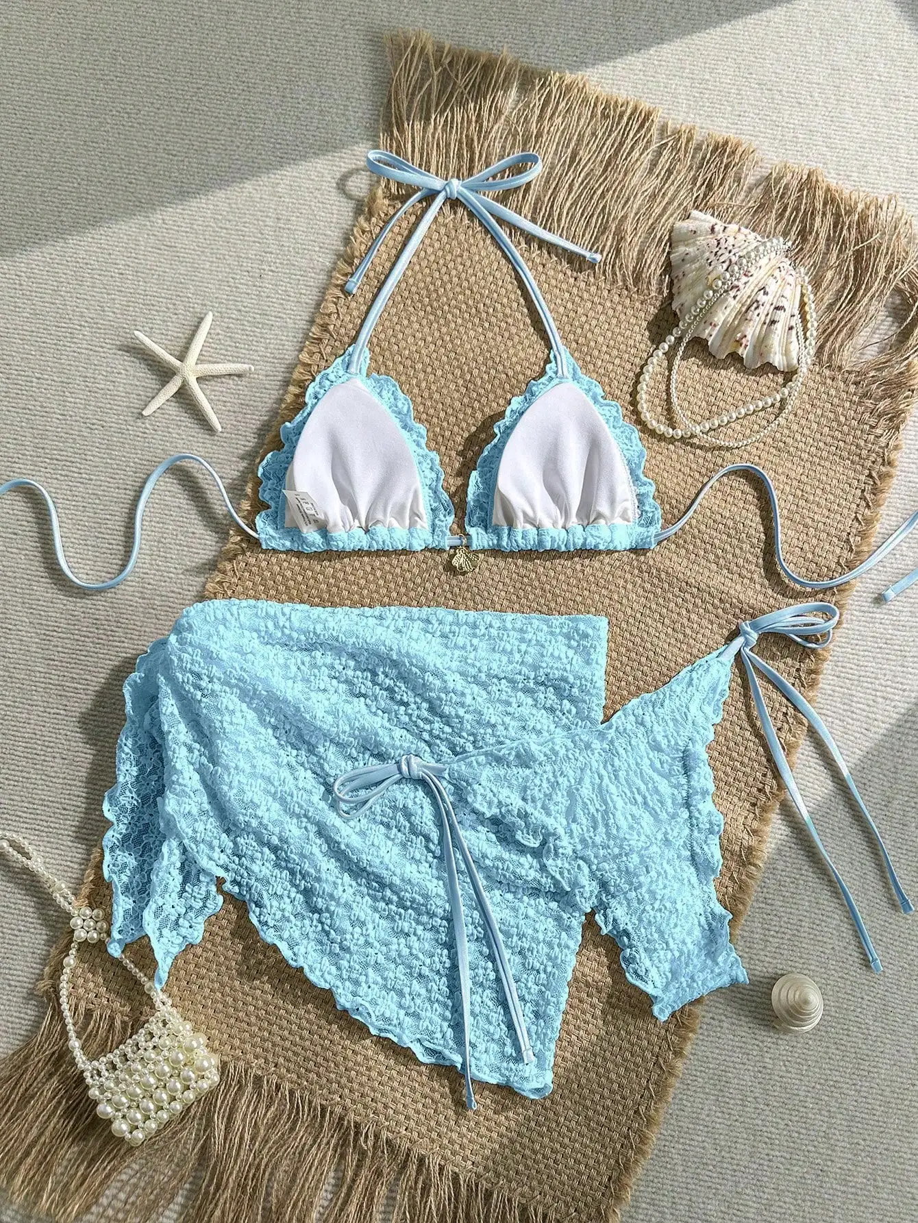 

Light Blue Lace 3-Piece Beach Set: Halter Triangle Top, Side-Tie Bottoms, And Ruffled Mini Skirt With Pearl Shell Accents