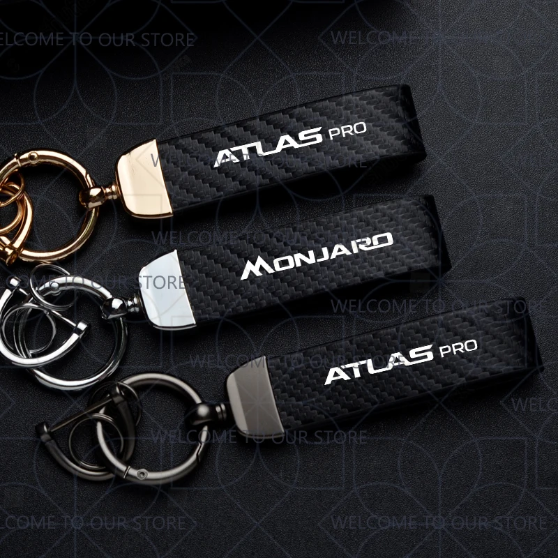 LLavero de coche para Geely Monjaro Atlas Por Logo llavero de Metal Widget accesorios de adornos de cuero de fibra de carbono