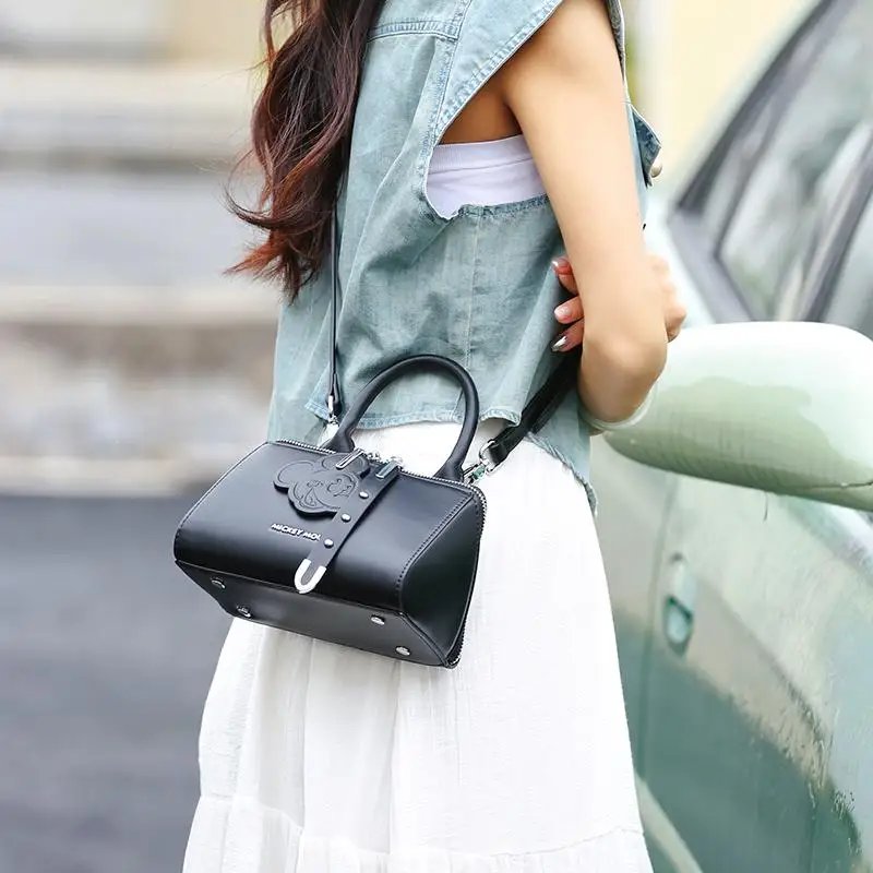 

Disney fashion trend light luxury Mickey handbag women's creative triangle multifunctional versatile crossbody bag