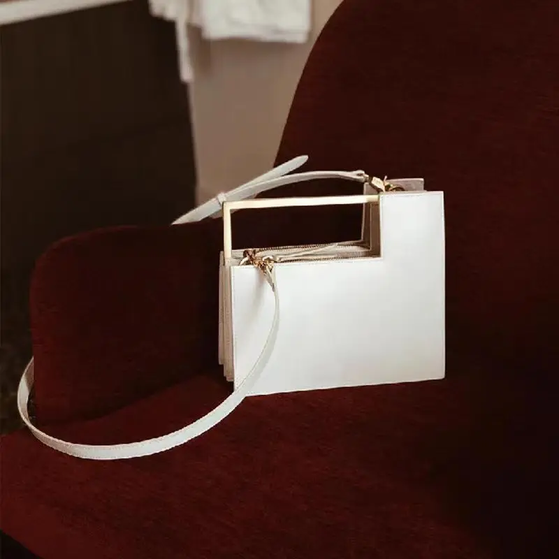 

Niche Designer French Luxury Retro Metal Rod Original Handbag High-end Fashion Simple Small Square Bag Popular Versatile Bag