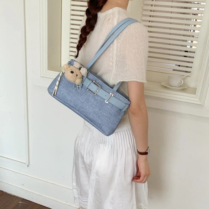 

Niche vintage motorcycle-style women's handbag for carrying under the arm2026New Simple Commuting Versatile Shoulder Bag
