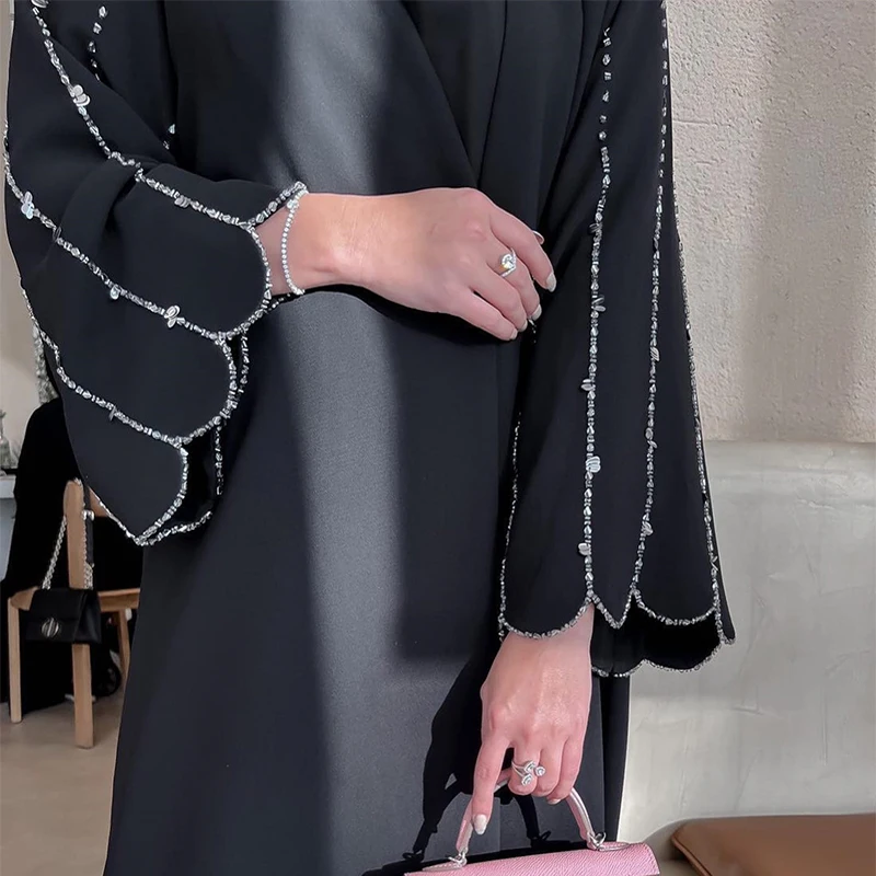 2025 OEM/ODM Eid Abaya haute qualité noir Long manteau brillant cristal dubaï ouvert Abaya porter des vêtements musulmans islamiques