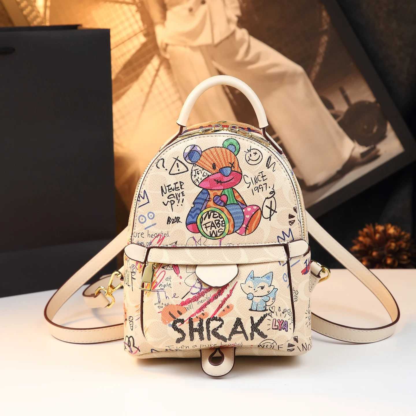 nouveau-sac-a-dos-en-cuir-ours-graffiti-mignon-2026-pour-femme-sac-bandouliere-de-luxe-pour-Etudiante-sac-de-navetteur-a-poignee-souple-et-durete-moyenne