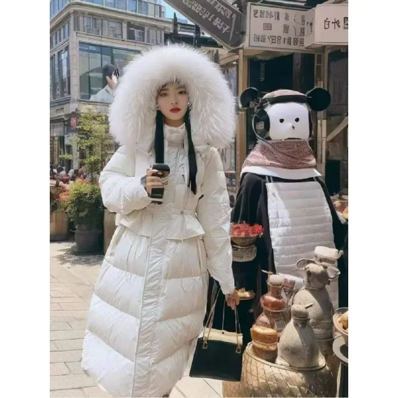 2026 سترة طويلة للنساء الشتاء مقنعين مع كبيرة الفراء طوق Cinched الخصر جديد الراقية معطف دافئ الوردي الملابس النسائية