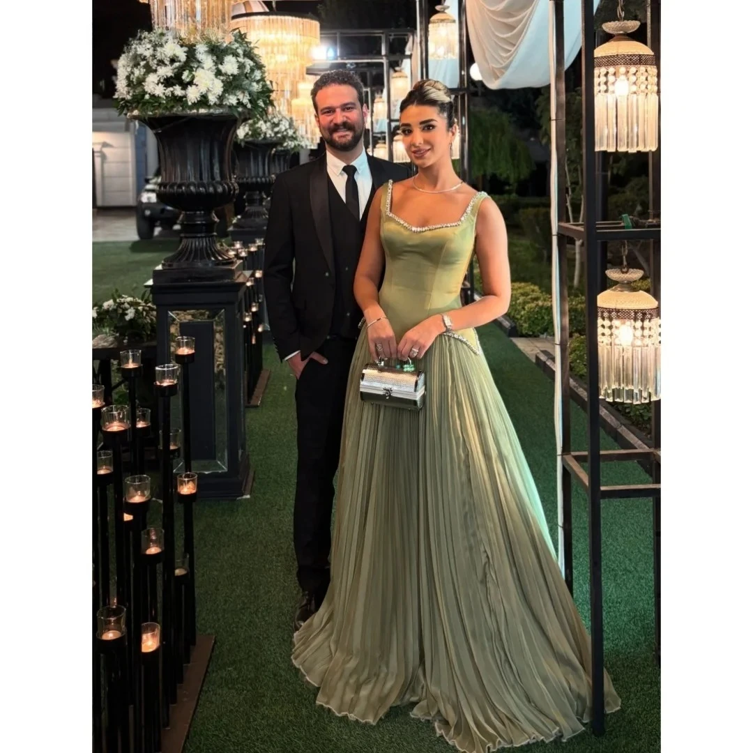 فستان حفلة موسيقية أخضر لامع بدون حمالات بحزام سباغيتي من الساتان على شكل حرف a بطول الأرض فساتين سهرة رسمية vestidos de noche