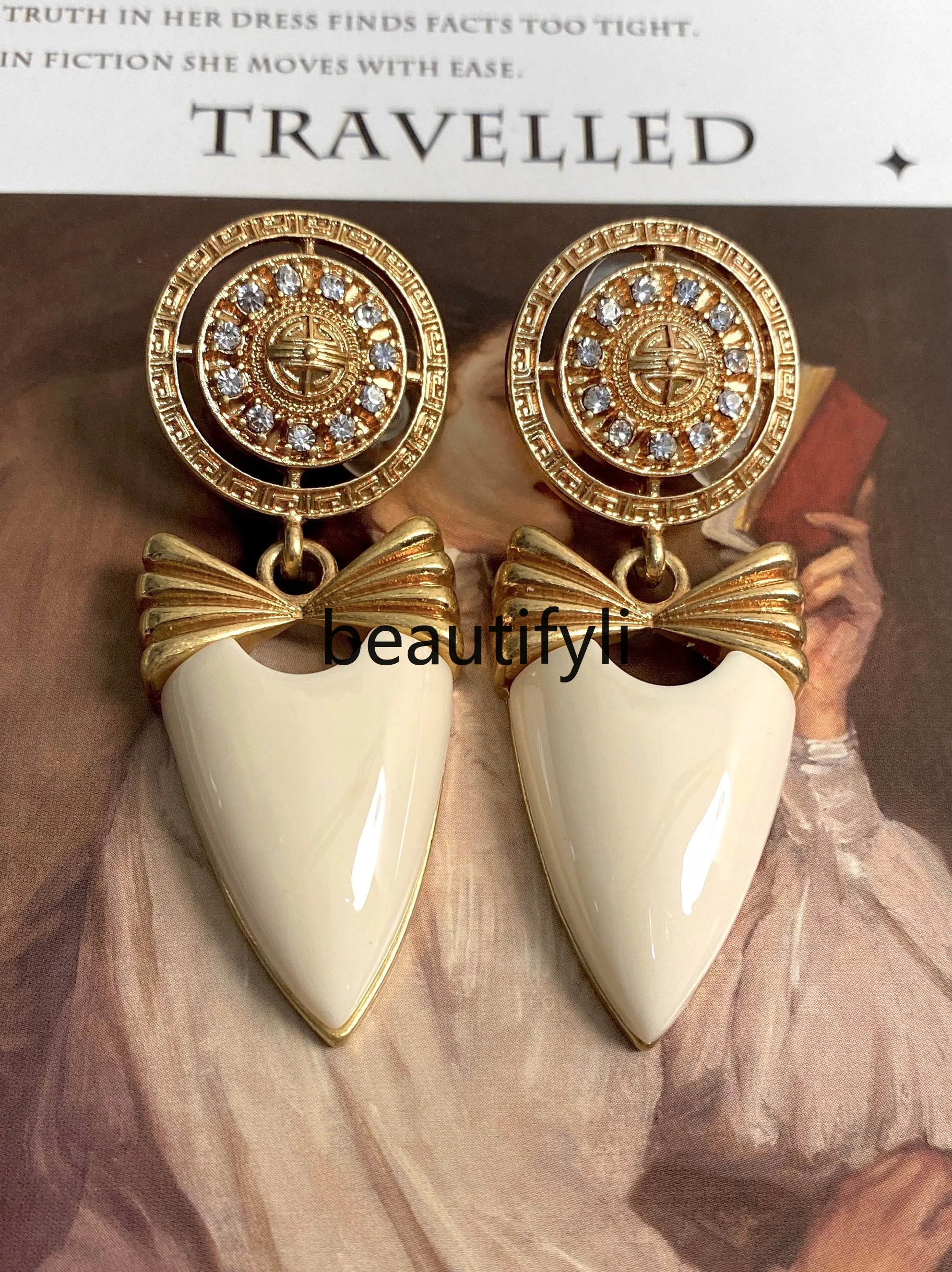 

Retro earrings look like cat antique style old items with the same medieval earrings