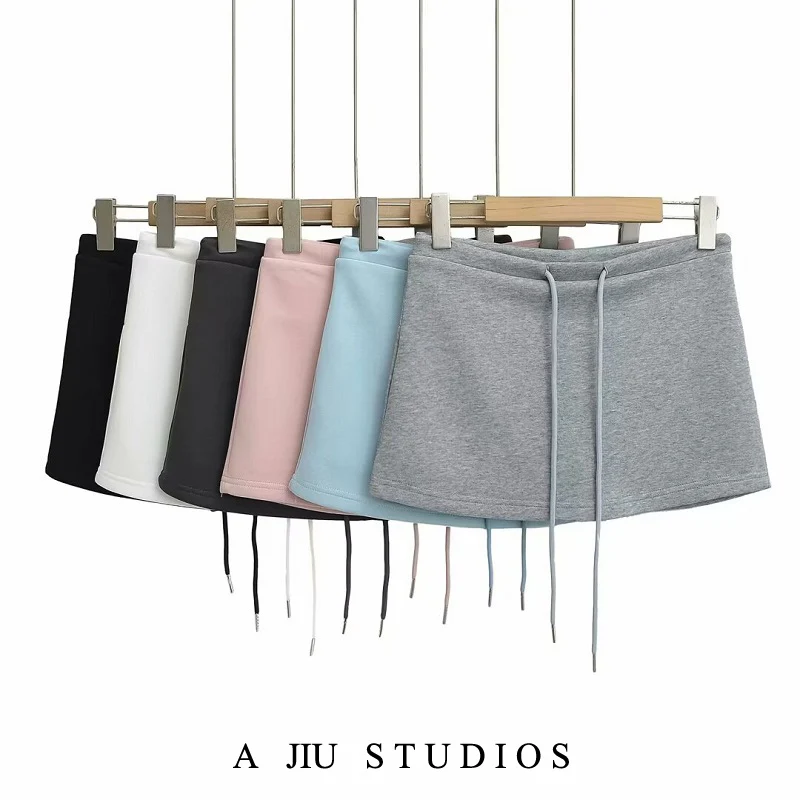 

Американская спортивная юбка с низкой талией для женщин, летняя универсальная повседневная антилегкая облегающая юбка трапециевидной формы...