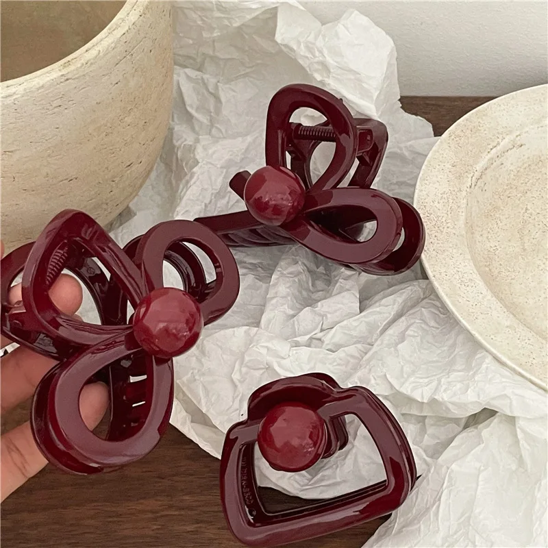 New for autumn and winter burgundy plastic cross bow disc hair grab clip cute red round ball hairpin hair grab.