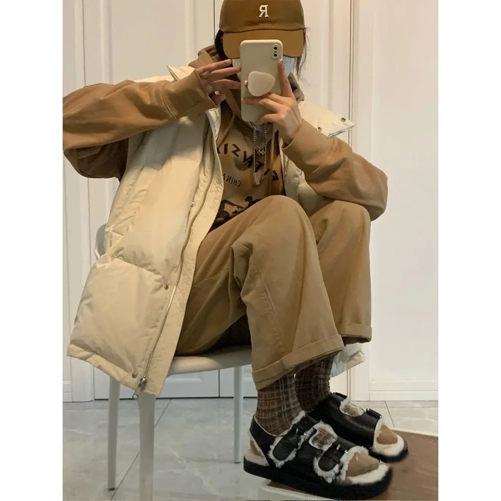 Chaleco de plumas a la moda para mujer, nuevo Otoño Invierno, grueso, holgado, de manga larga, Color puro, cierre de un solo botón