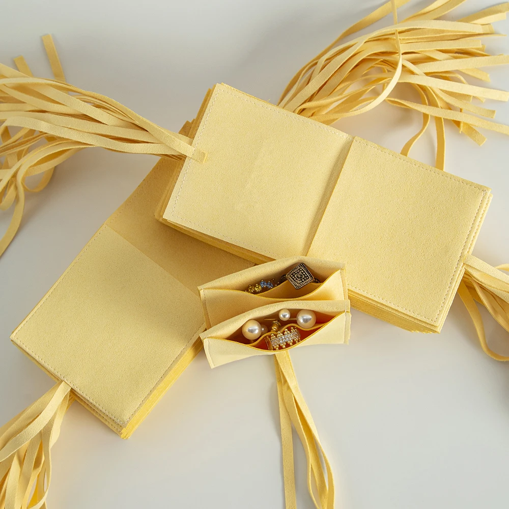 شخصية الأصفر ستوكات مجوهرات شنطة هدايا 100 قطع المخملية الجلد المدبوغ أقراط خواتم عيد الميلاد حزب الحقيبة بشكل منفصل حماية أكياس