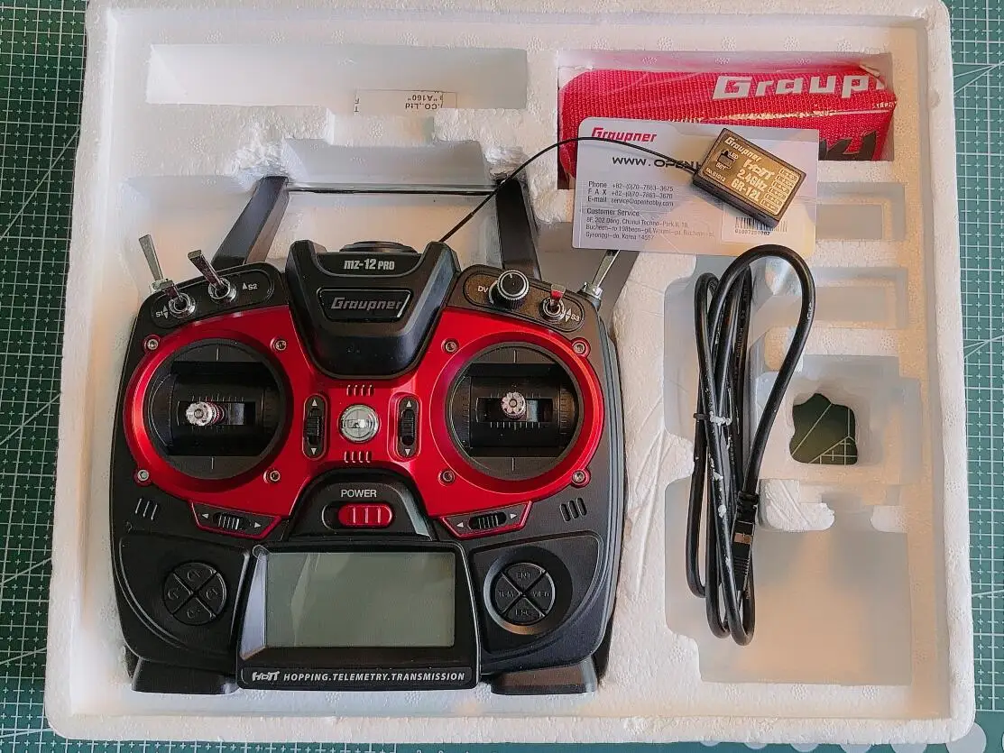 

Graupner mz-12 PRO 12 Channel Telemetry HoTT Radio System 250 model memories, 5 model types, real-time voice Tranmitter GR12L RX